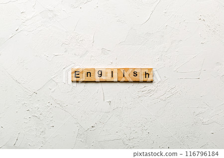 english word written on wood block. english text on cement table for your desing, concept english word written on wood block. english text on cement table for your desing, concept 116796184