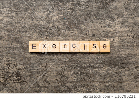 exercise word written on wood block. exercise text on table, concept 116796221
