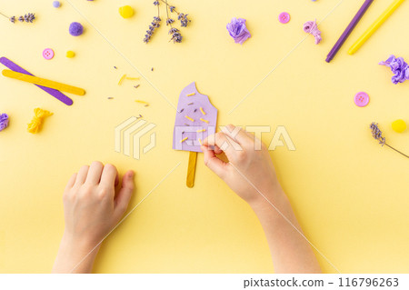 Paper ice cream craft for kids at home or kindergarten. Summer ideas. 116796263