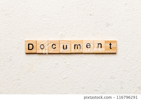 Document word written on wood block. Document text on cement table for your desing, concept Document word written on wood block. Document text on cement table for your desing, concept 116796291