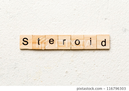 steroid word written on wood block. steroid text on table, concept 116796303