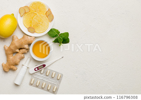 Natural cold and flu home remedies. Natural ingredients for immunity stimulation and viruses protection. top view flat lay Natural cold and flu home remedies. Natural ingredients for immunity stimulation and viruses protection. top view flat lay 116796308