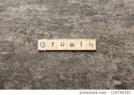 growth word written on wood block. growth text on table, concept growth word written on wood block. growth text on table, concept 116796381
