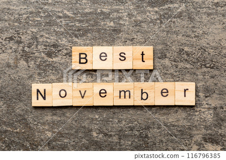 best november word written on wood block. best november text on table, concept 116796385