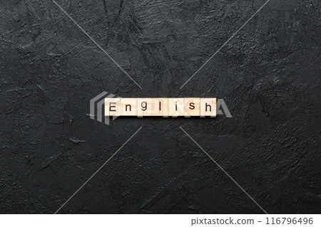 english word written on wood block. english text on cement table for your desing, concept 116796496