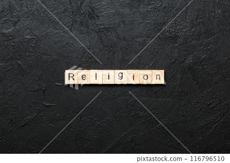 Religion word written on wood block. Religion text on cement table for your desing, concept Religion word written on wood block. Religion text on cement table for your desing, concept 116796510