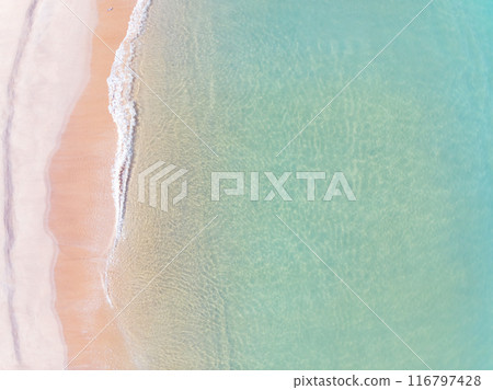 Aerial top view nature background of waves crashing in the ocean sea water, Drone view of sea waves in bird eye view photo,Beach sea background 116797428
