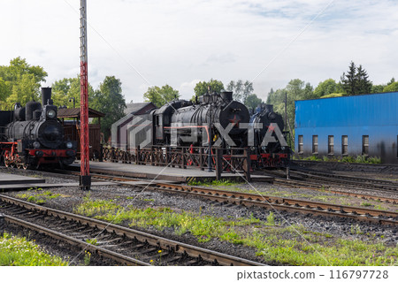 Black steam locomotives are at Sortavala Central Railway Station 116797728
