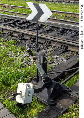 An old manual powered railroad switch, vertical photo An old manual powered railroad switch, vertical photo 116797730