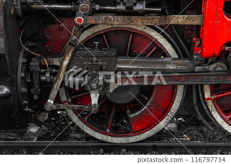 Wheel and power details of vintage steam locomotive, close-up Wheel and power details of vintage steam locomotive, close-up 116797734