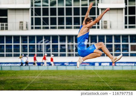 long jump men, athlete in flight, athletics competition 116797758