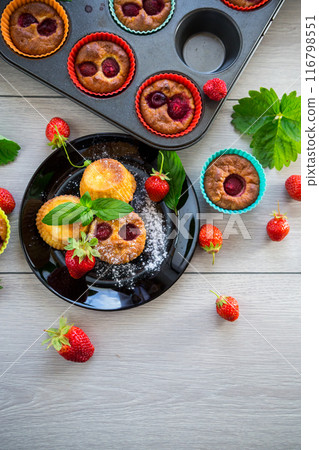 Sweet curd muffins with strawberry filling 116798551