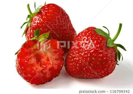 Fragrant ripe strawberry whole and bitten close-up isolated on a white background. Berry antioxidant 116799342
