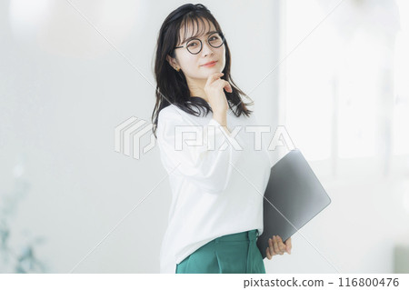 Young woman in office casual wear 116800476