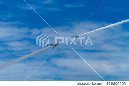 Blue Impulse performs an opposite continuous roll while leaving a contrail behind Blue Impulse performs an opposite continuous roll while leaving a contrail behind 116800603