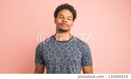 Amused man laughing loudly at funny joke while looking at camera Amused man laughing loudly at funny joke while looking at camera 116800828