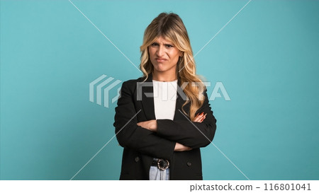 Angry transgender businesswoman shaking lips and frowning Angry transgender businesswoman shaking lips and frowning 116801041