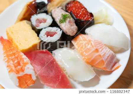 Sushi on a white plate Sushi on a white plate 116802347