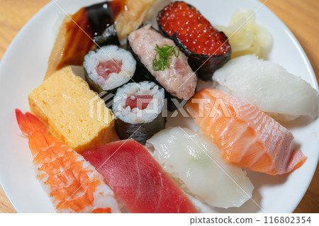 Sushi on a white plate Sushi on a white plate 116802354