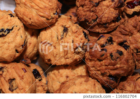 Homemade oat cookies with raisins and cranberries 116802704