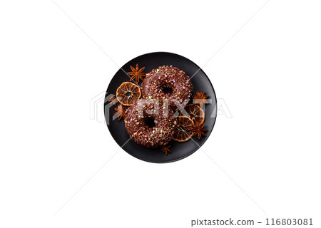 Delicious fresh donuts with filling and chocolate coating Delicious fresh donuts with filling and chocolate coating 116803081