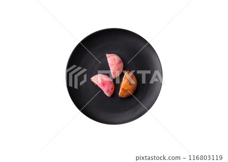 Delicious colorful asian mochi sweets with rice dough shell Delicious colorful asian mochi sweets with rice dough shell 116803119
