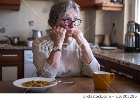 woman with no food appetite. anorexia symptoms, food poisoning woman with no food appetite. anorexia symptoms, food poisoning 116803290