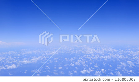 Horizontal gradient blue sky with white fluffy clouds 116803302