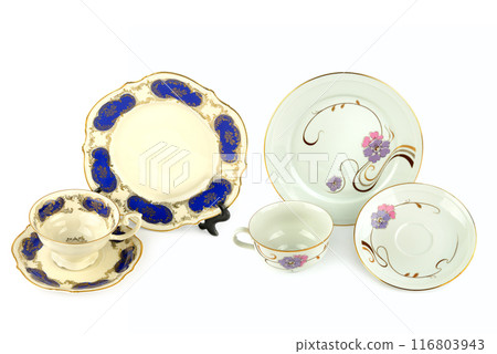 Vintage porcelain cups and saucer isolated on white. Collage. Vintage porcelain cups and saucer isolated on white. Collage. 116803943
