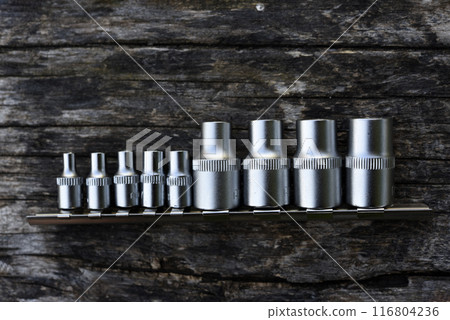 A set of end heads and nozzles. Chrome keys. Tools. A set of end heads and nozzles. Chrome keys. Tools. 116804236