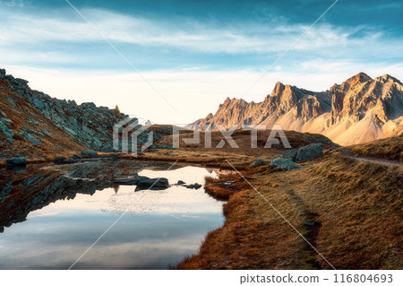 Landscape of Lac Long with Massif Des Cerces reflection during autumn in Claree valley at France Landscape of Lac Long with Massif Des Cerces reflection during autumn in Claree valley at France 116804693
