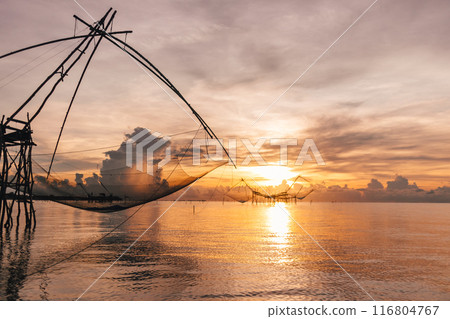 Villager large fish net lifting in Songkhla lake, Phatthalung, Thailand. Villager large fish net lifting in Songkhla lake, Phatthalung, Thailand. 116804767