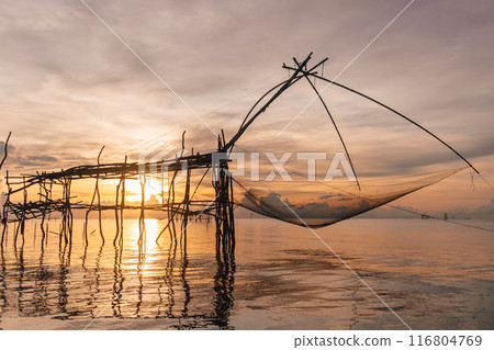 Villager large fish net lifting in Songkhla lake, Phatthalung, Thailand. Villager large fish net lifting in Songkhla lake, Phatthalung, Thailand. 116804769