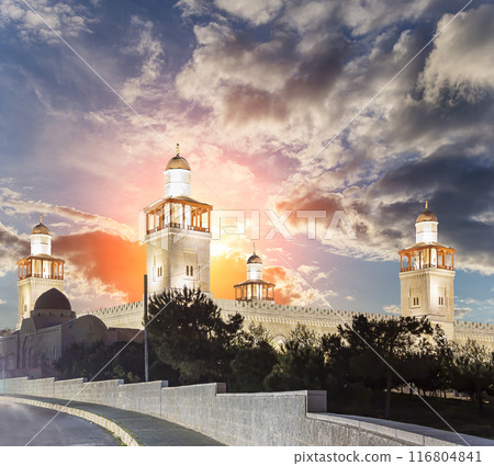 King Hussein Bin Talal mosque in Amman (at night), Jordan. Against the background of a beautiful sky with clouds King Hussein Bin Talal mosque in Amman (at night), Jordan. Against the background of a beautiful sky with clouds 116804841