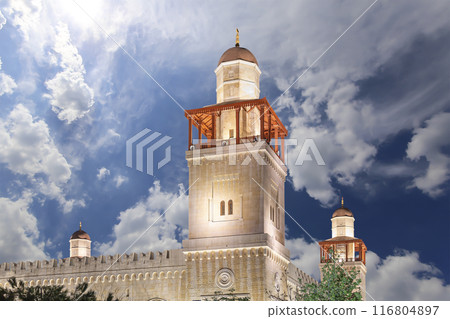 King Hussein Bin Talal mosque in Amman (at night), Jordan.  Against the background of a beautiful sky with clouds 116804897