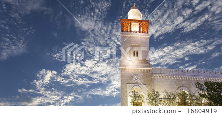 King Hussein Bin Talal mosque in Amman (at night), Jordan.  Against the background of a beautiful sky with clouds 116804919
