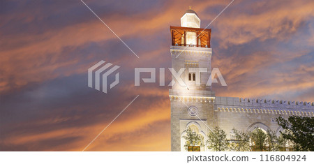 King Hussein Bin Talal mosque in Amman (at night), Jordan.  Against the background of a beautiful sky with clouds 116804924