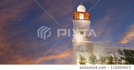 King Hussein Bin Talal mosque in Amman (at night), Jordan.  Against the background of a beautiful sky with clouds 116804925