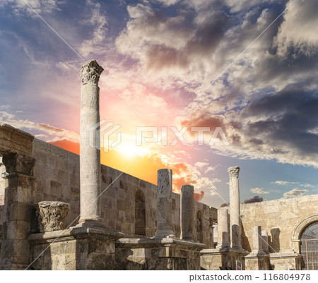 Roman Theatre in Amman, Jordan -- theatre was built the reign of Antonius Pius (138-161 CE), the large and steeply raked structure could seat about 6000 people. Against the sky with clouds 116804978