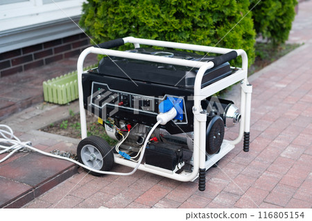 Power supply generator placed on street sidewalk. outdoor diesel power generator in Ukraine. Power supply generator placed on street sidewalk. outdoor diesel power generator in Ukraine. 116805154