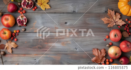 Autumn Fruits and Leaves on Rustic Wood 116805875