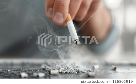 Hand Lighting a Cigarette With Ash 116805919