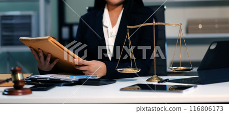 Judge gavel with Justice lawyers having team meeting at law firm background. Concepts of Law and Legal services. Judge gavel with Justice lawyers having team meeting at law firm background. Concepts of Law and Legal services. 116806173