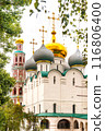 MOSCOW, RUSSIA - JUNE 09, 2021 Church building with golden domes Smolensky cathedral on the territory of the Novodevichy Monastery in the Russian capital Moscow, dated 1524 - 1525 116806400