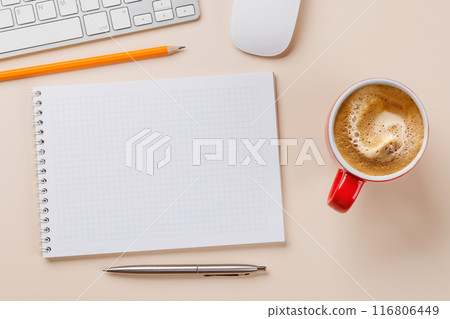 Office desk table with notepad, cup of coffee and supplies Office desk table with notepad, cup of coffee and supplies 116806449