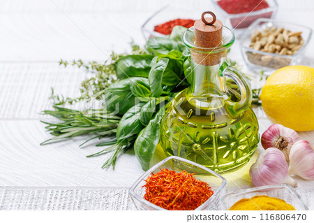 Various herbs and spices on the table 116806470