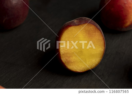 ripe and sweet nectarine fruit on the table 116807565