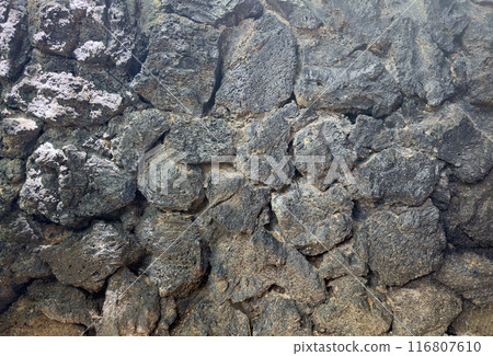 Black volcanic rock background 116807610