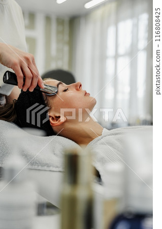 Relaxing facial massage. Health care. Relaxing facial massage. Health care. 116808425