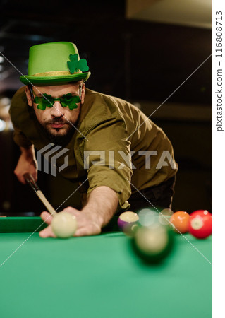 Player in green hat and shamrock eyewear 116808713
